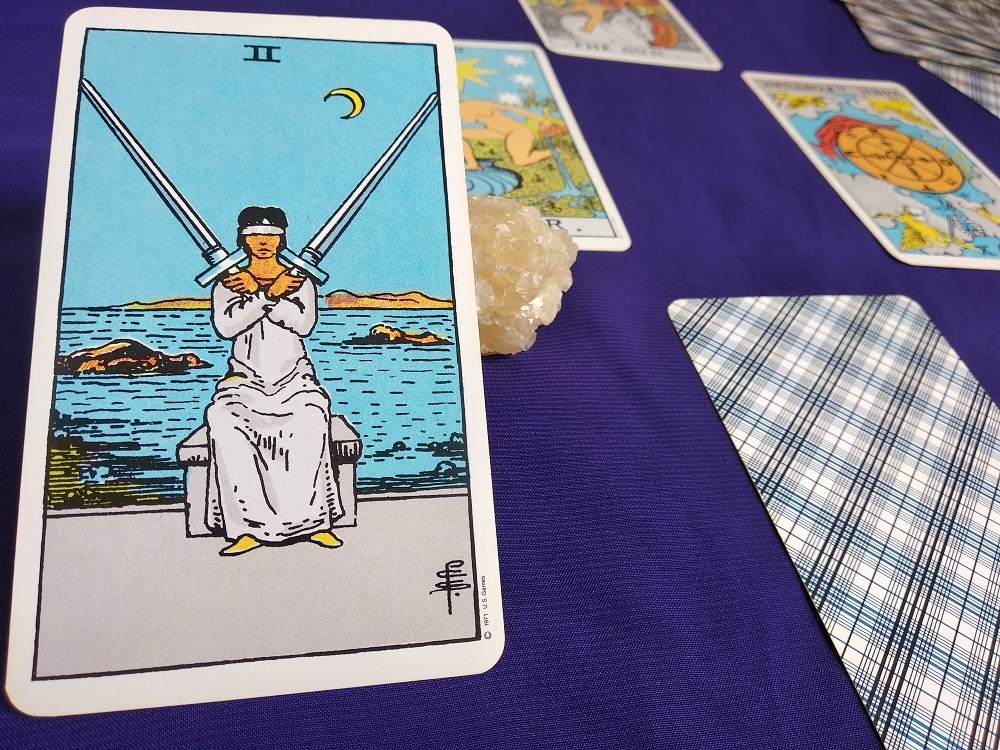 The Two Of Swords Tarot Card Meaning Upright and Reversed