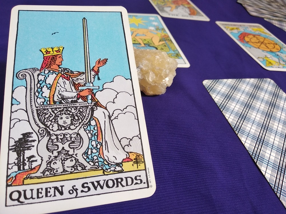 The Queen of Swords Tarot Card Meaning Upright and Reversed
