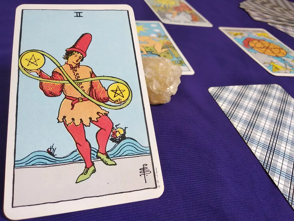 The Two of Pentacles Tarot Card Meaning – Minor Arcana