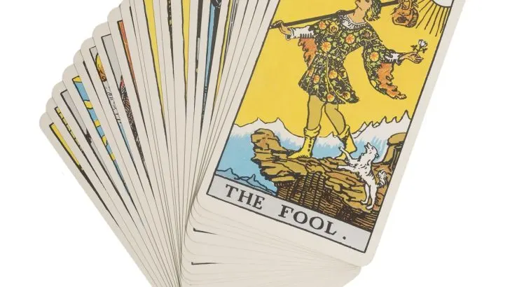 Rider-Waite Tarot cards deck with the first card, The Fool (0) showing