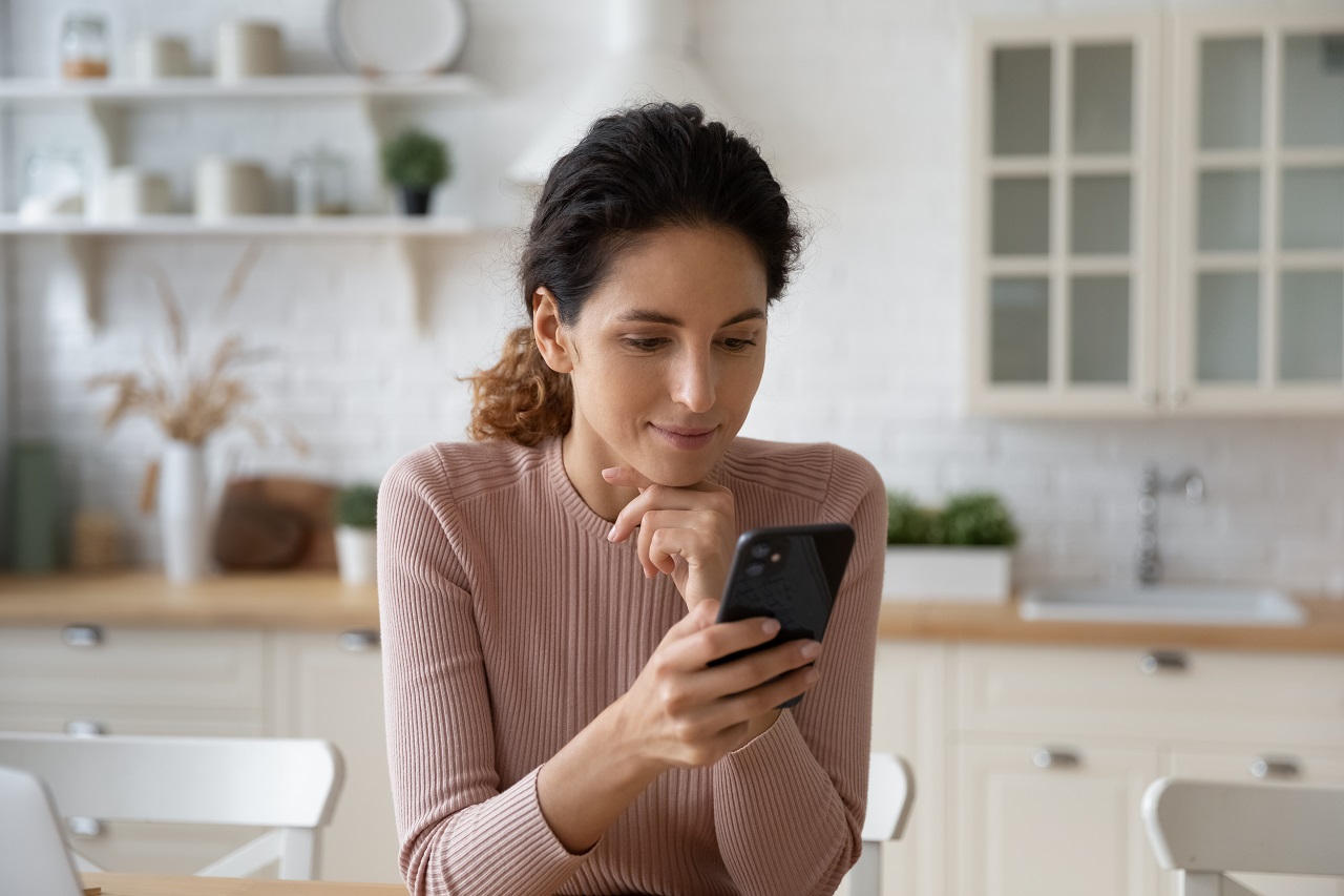 Woman Smiling Texting